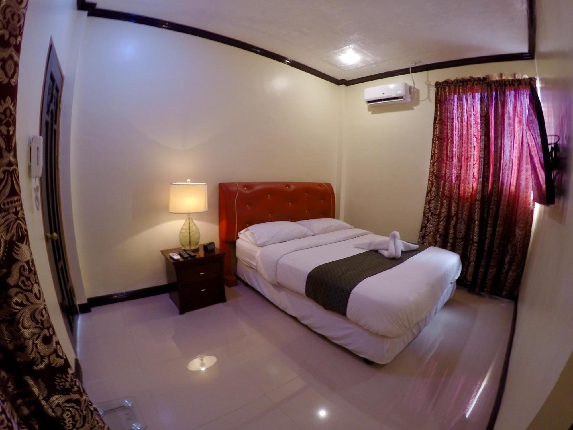The Executive Villa Inn & Suites Davao City Pokoj fotografie