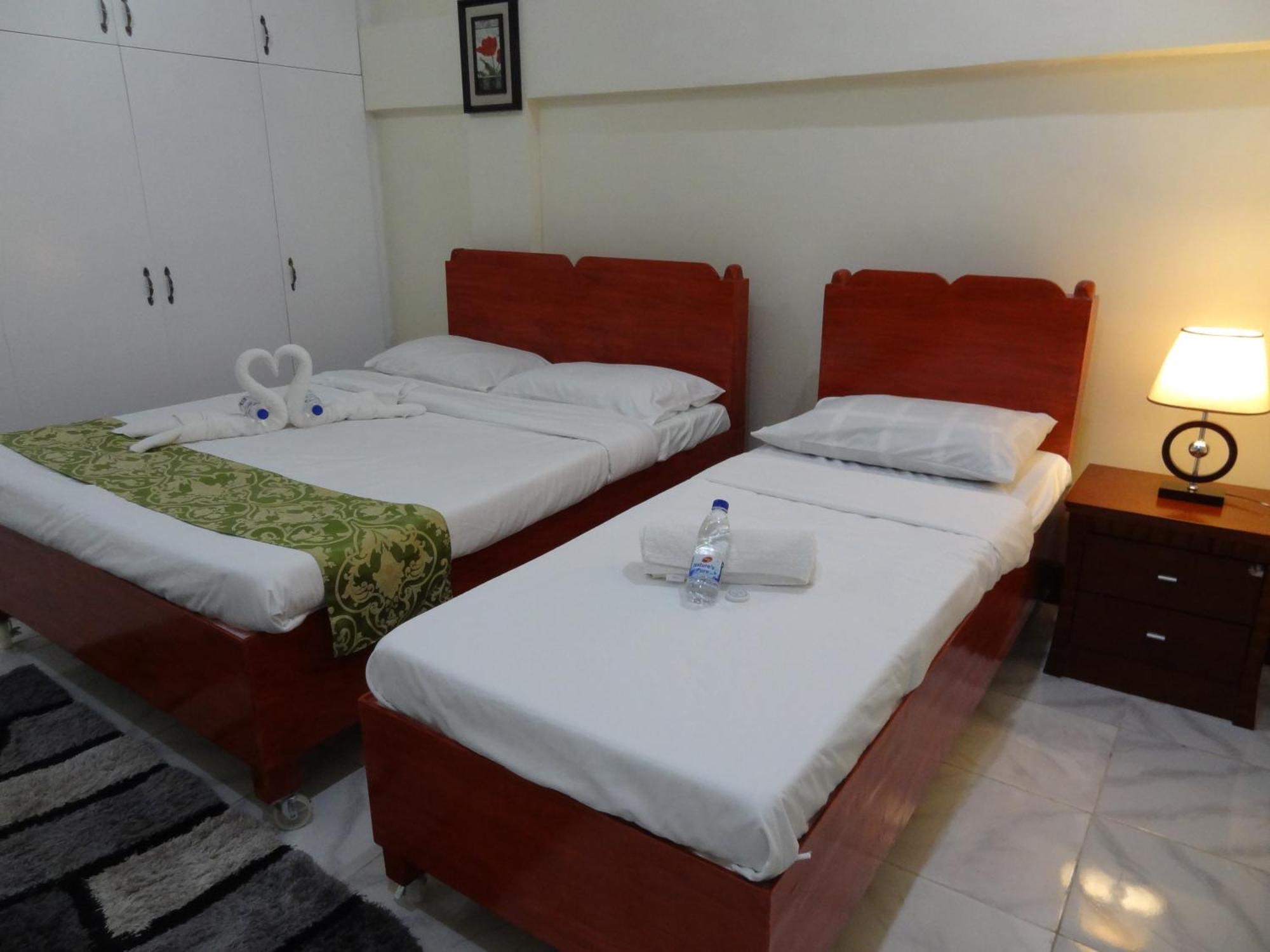 The Executive Villa Inn & Suites Davao City Pokoj fotografie